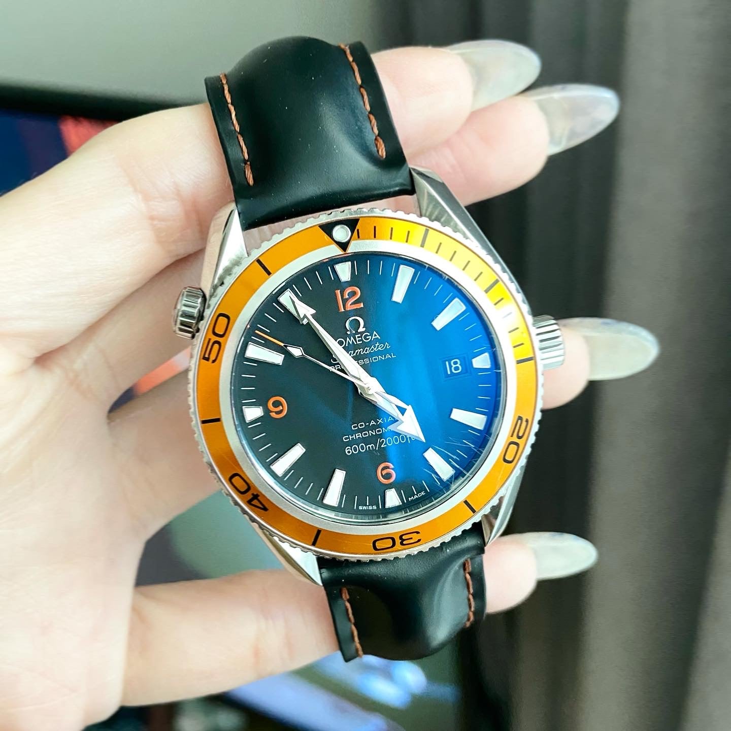 Omega planet clearance ocean 42mm orange